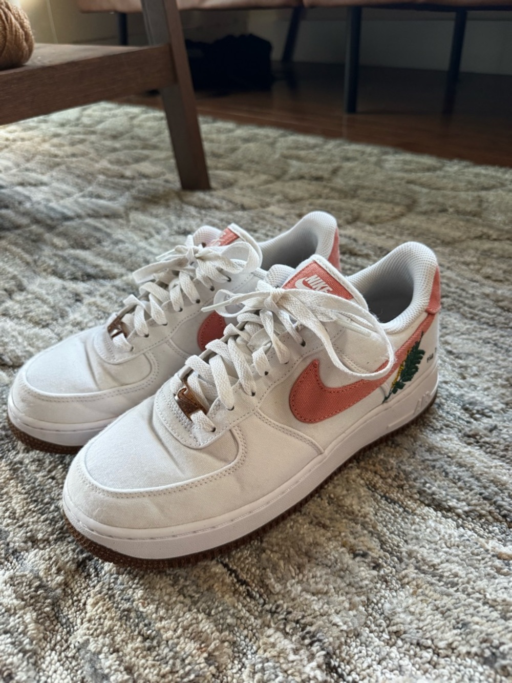 Nike White Low-Top Sneakers with Coral Swoosh and Green Embroidery